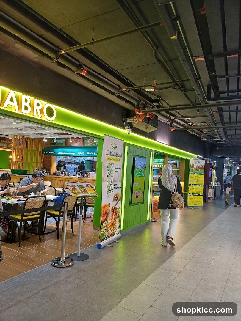 Food Court Interior with Green-Themed Restaurant