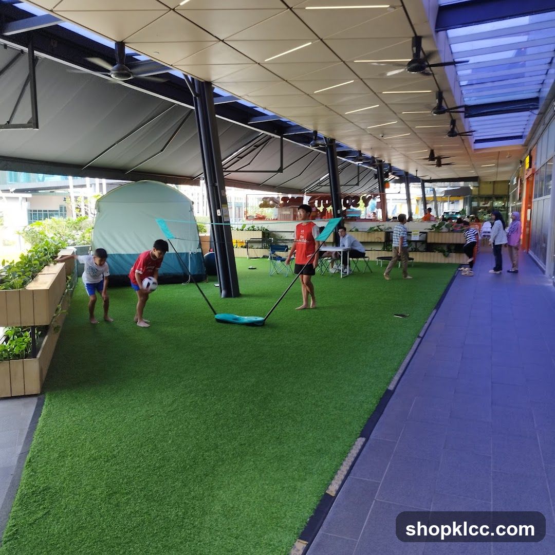 Outdoor Play Area with Kids Playing Soccer