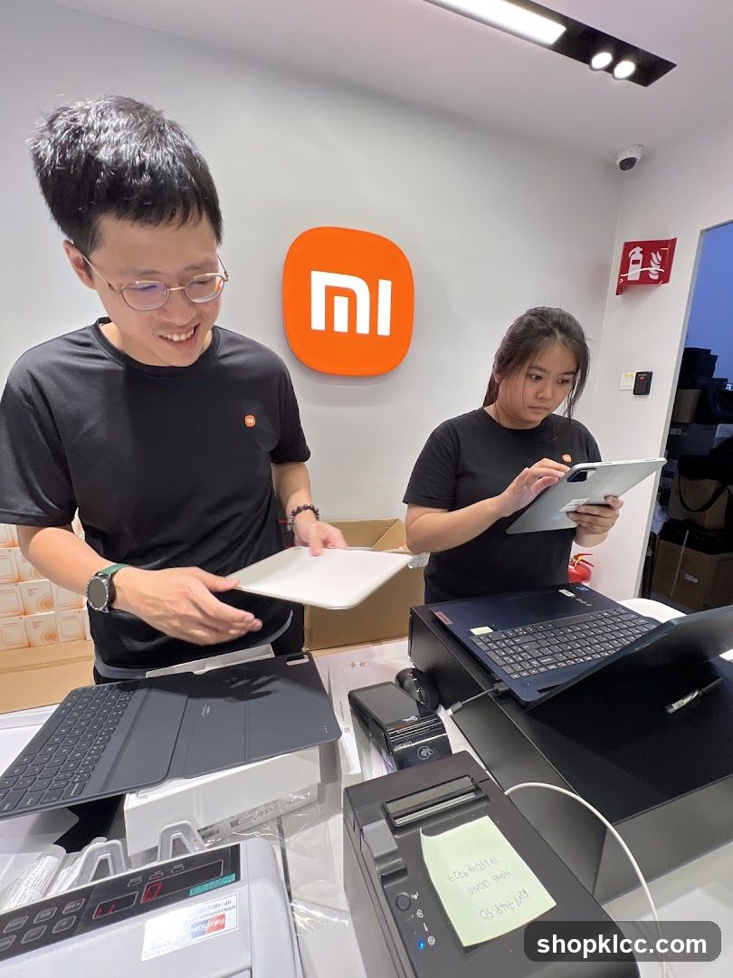 Tech Store Interior with Staff