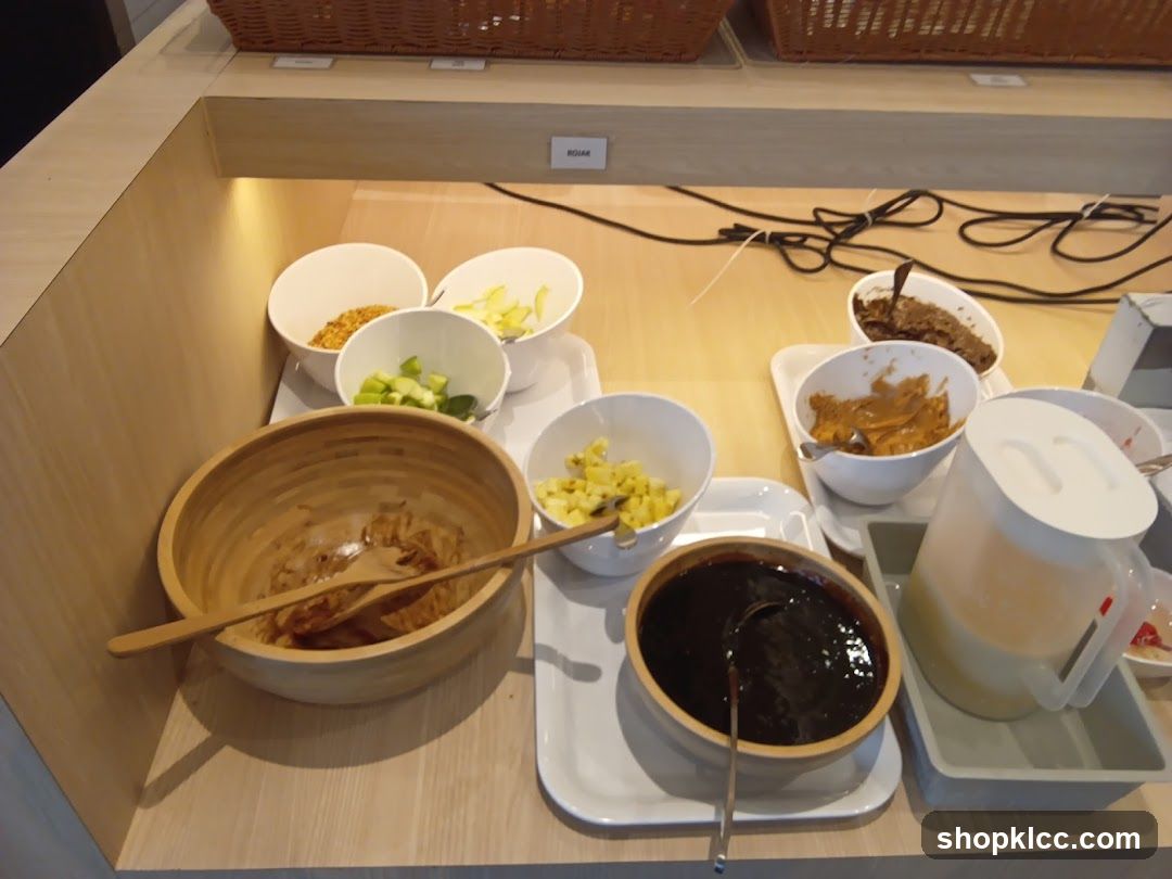 Bowl of food with utensils and condiments