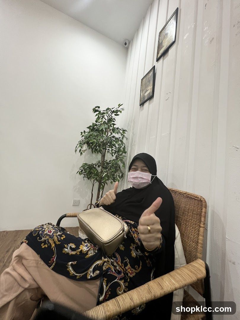 Woman Giving Thumbs Up in Interior Setting