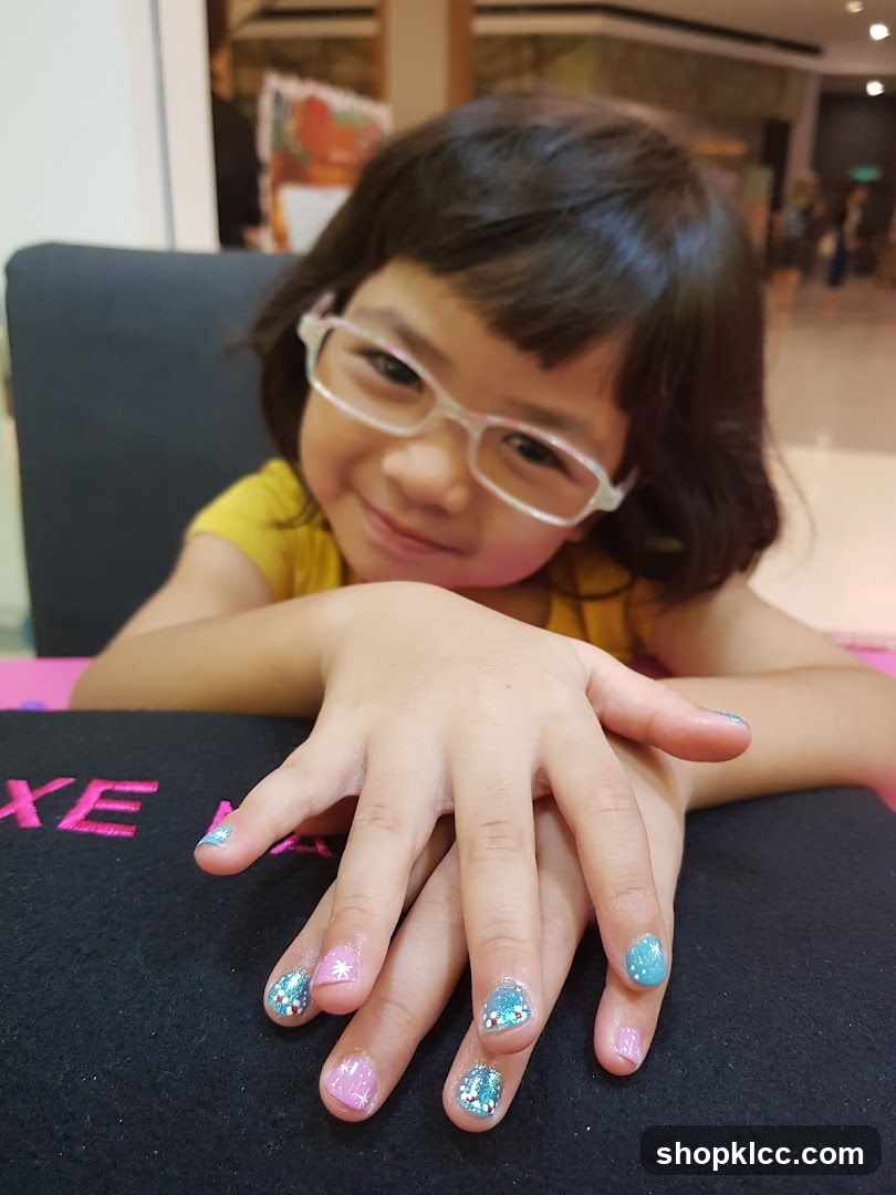 Child with Glitter Nail Art