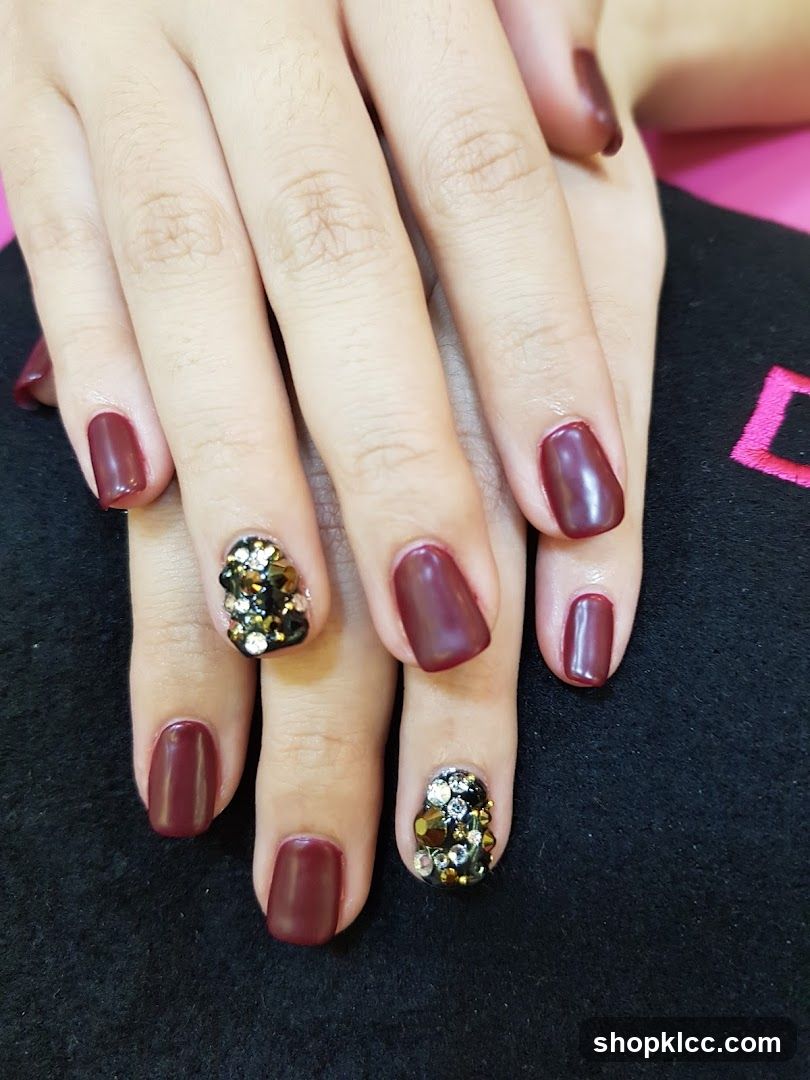Maroon and Glitter Nail Art