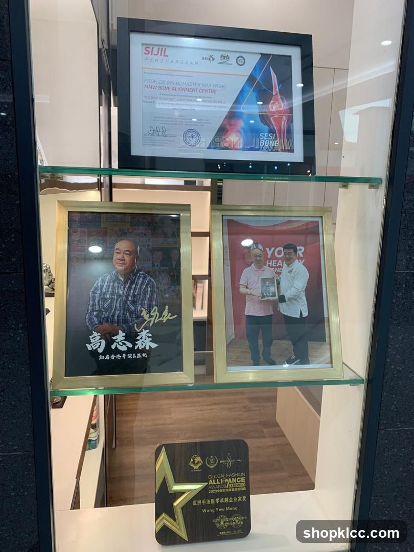 Display Case with Certificates and Photos