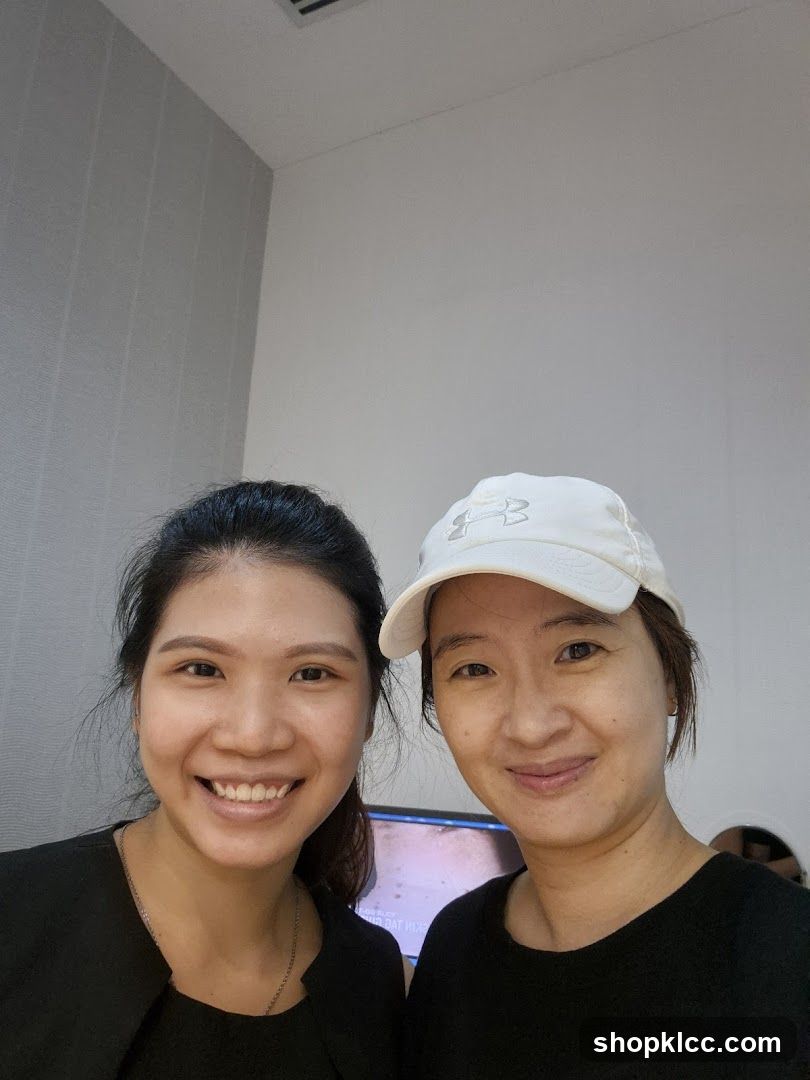 Two women smiling indoors