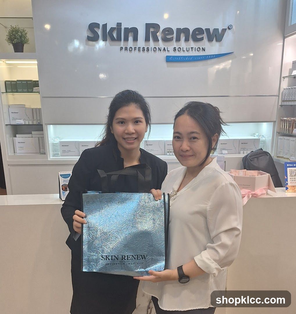 Skin Renew Store Interior with Staff Holding Gift Bag