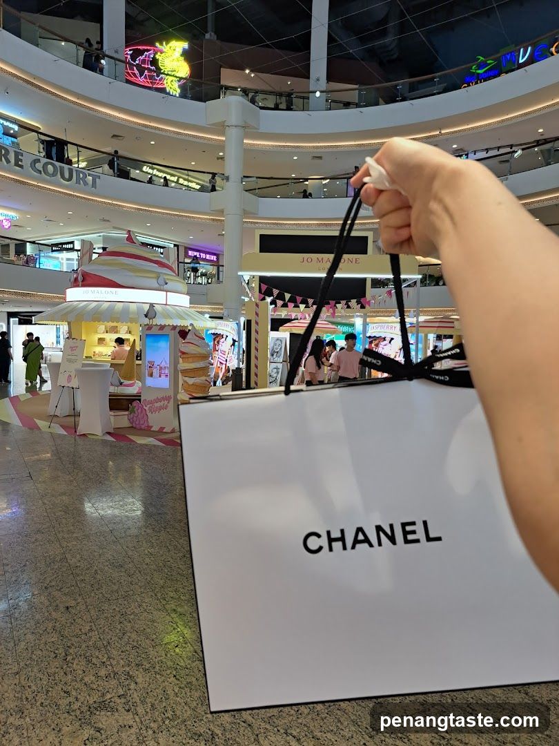 Chanel shopping bag in a mall