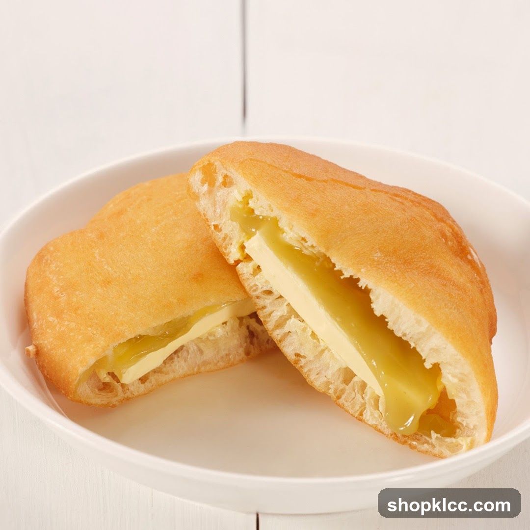 Cheese-filled pastry on a white plate