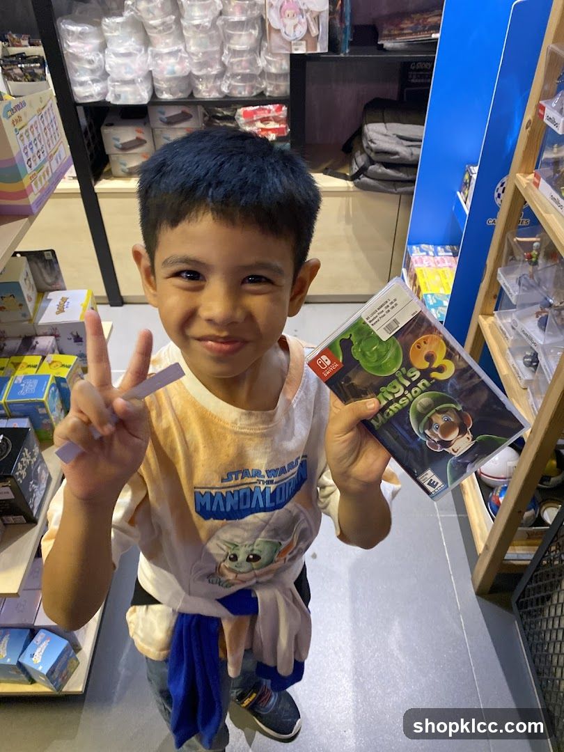Child in Toy Store Holding Game