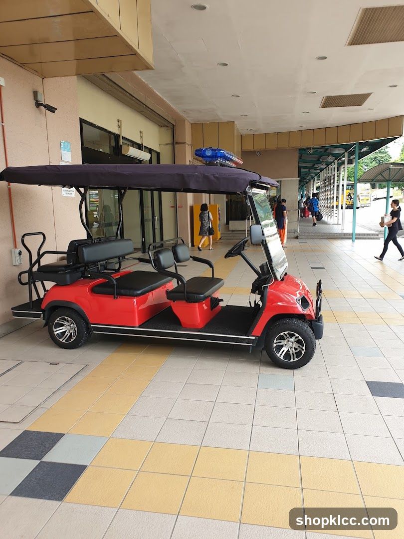 Red Shuttle Vehicle at Entrance