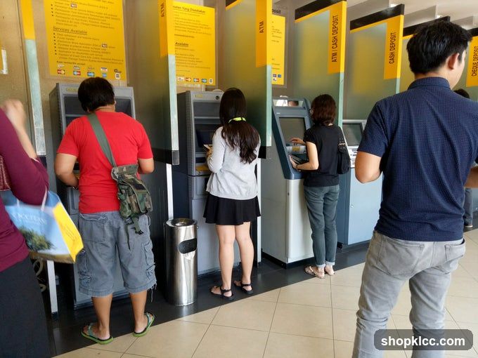People at ATMs