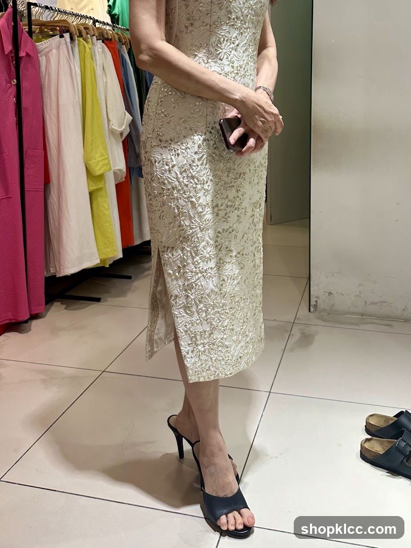 Woman in Lace Dress at Clothing Store