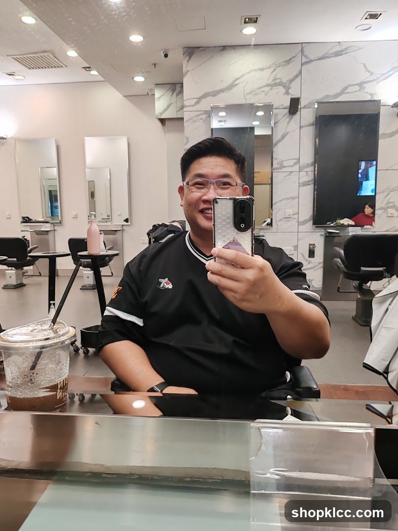 Man taking selfie in salon