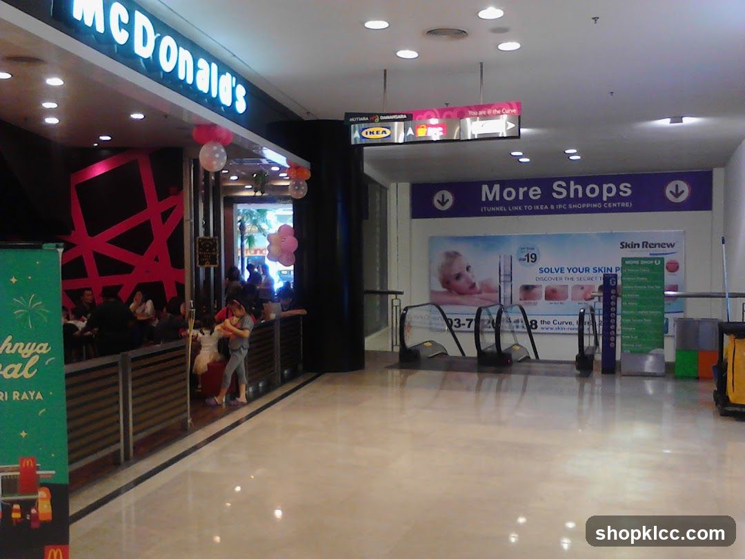 Shopping Center Corridor with McDonald's and Store Entrance