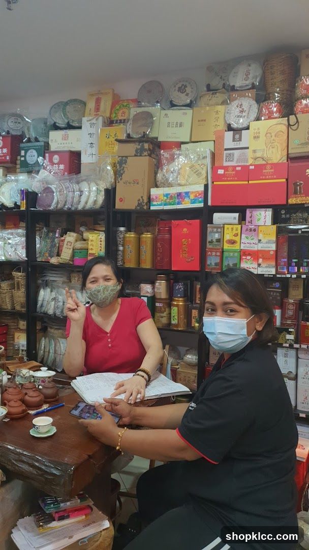 Tea Shop Interior with Staff
