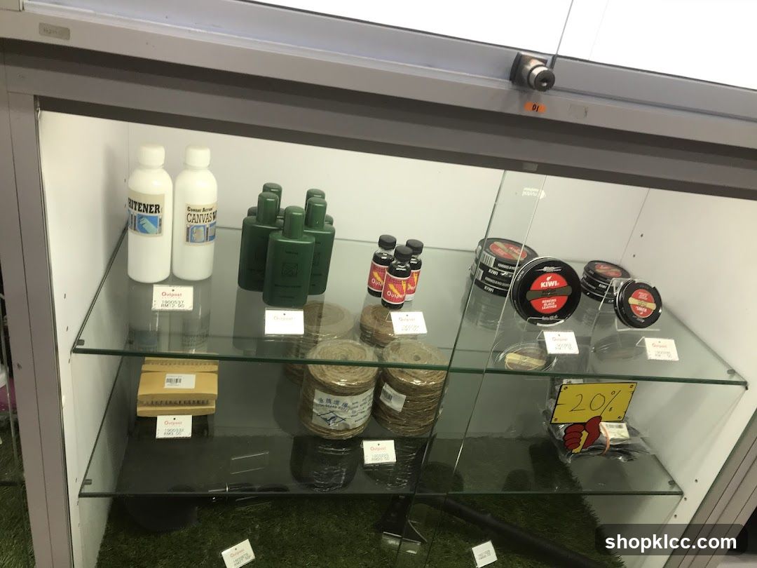 Display Case with Cleaning Supplies and Shoe Care Products