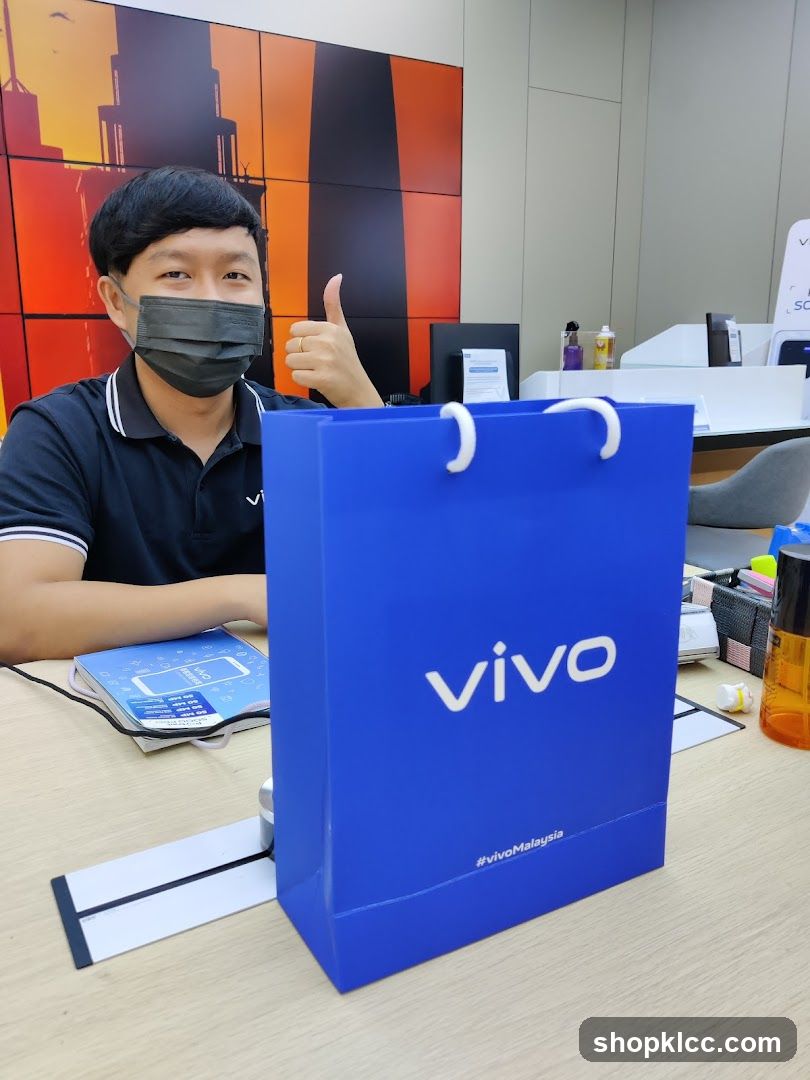 Vivo Store Interior with Staff and Shopping Bag