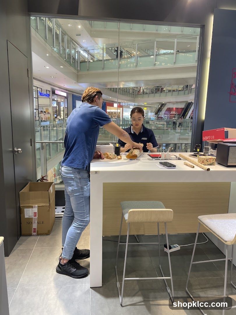 Staff preparing items at a counter