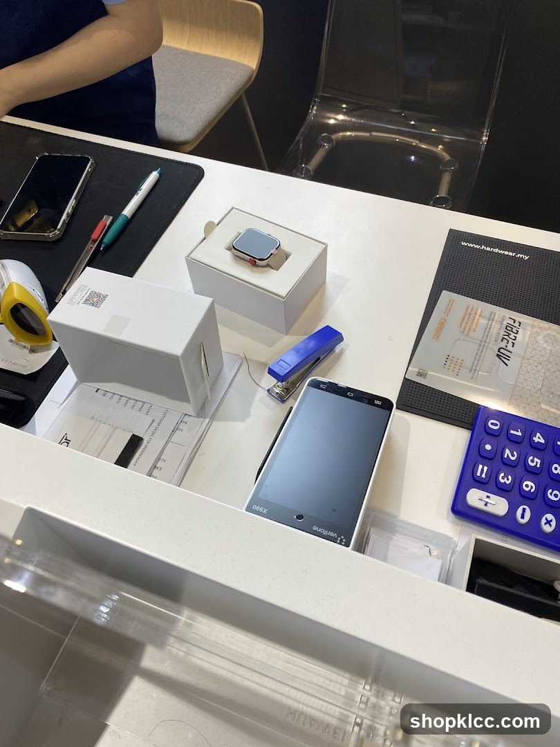 Table with electronics and office supplies
