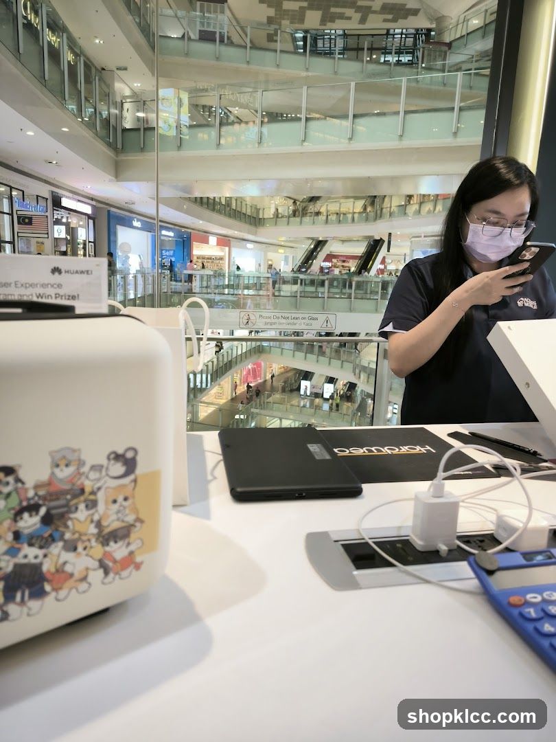 Mall Interior with Woman Using Phone