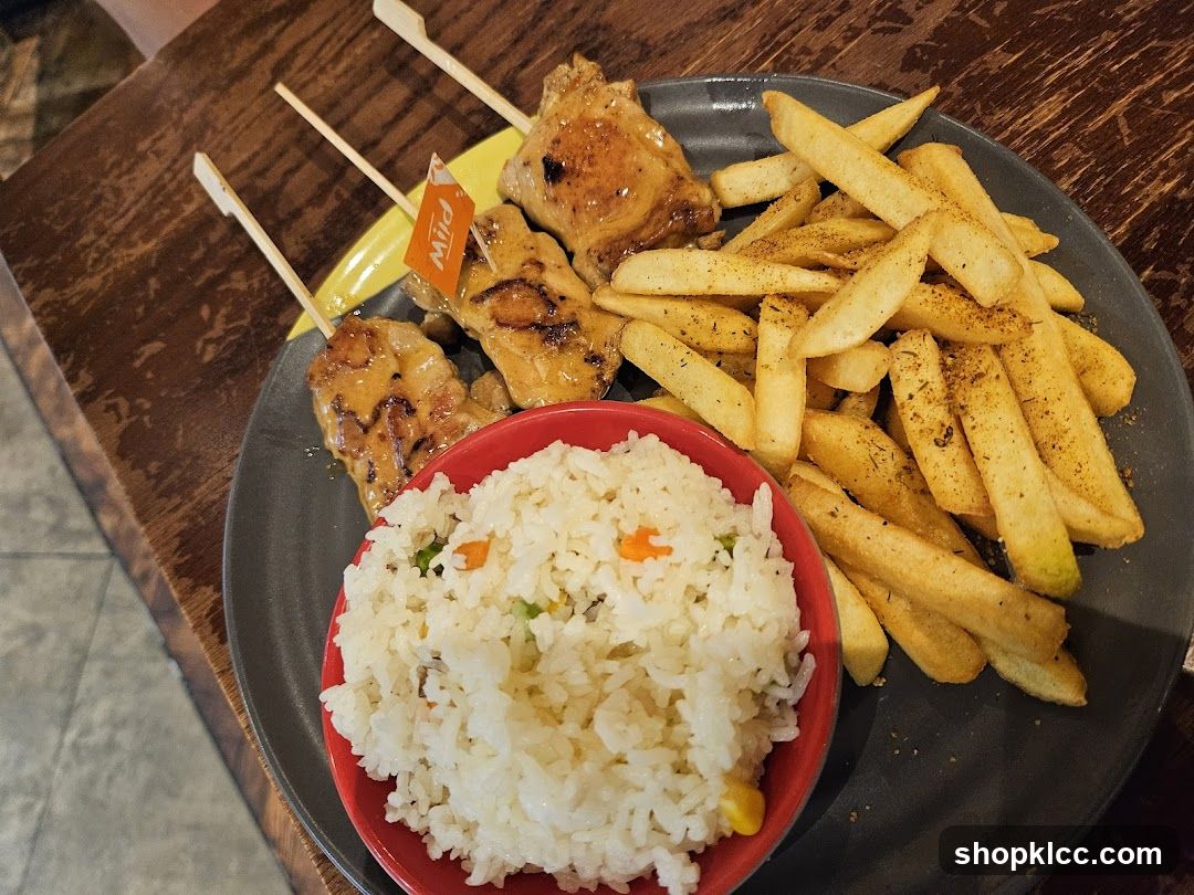 Chicken Skewers with Fries and Rice