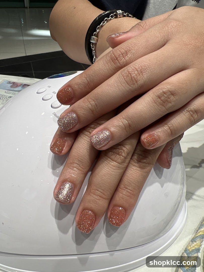 Nails being cured under a UV lamp