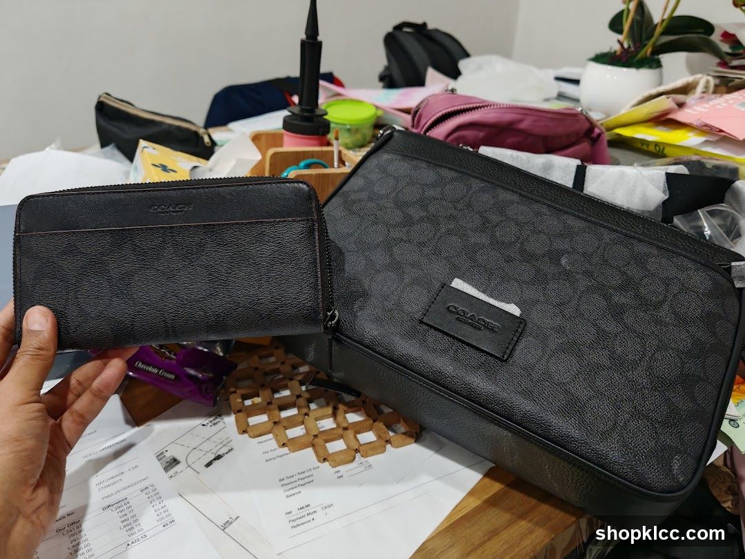 Coach Wallets on Table