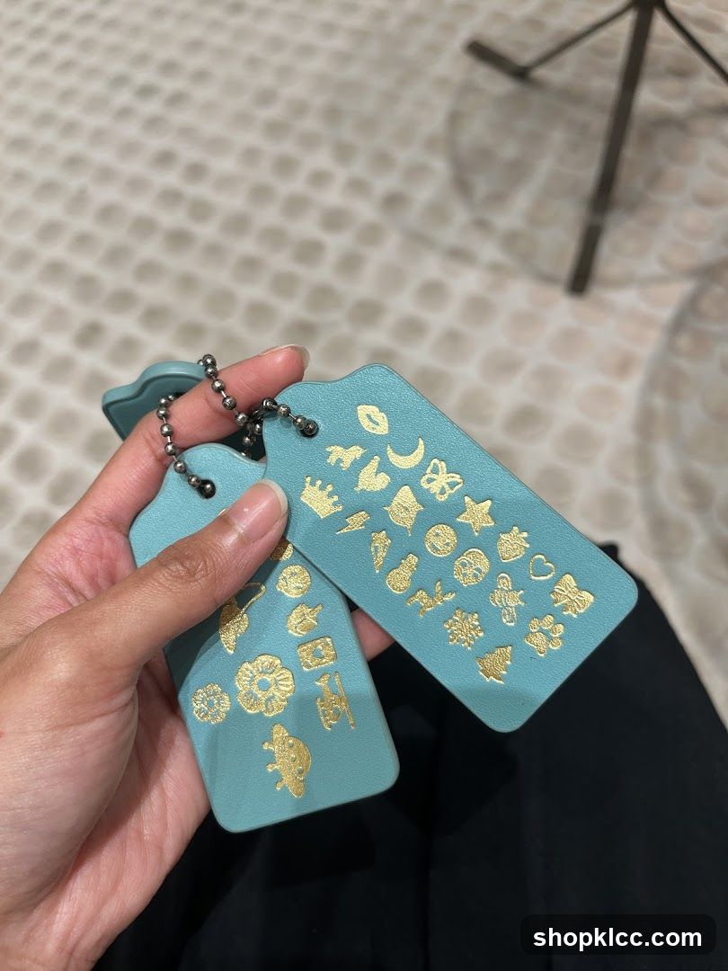 Blue Keychains with Gold Symbols