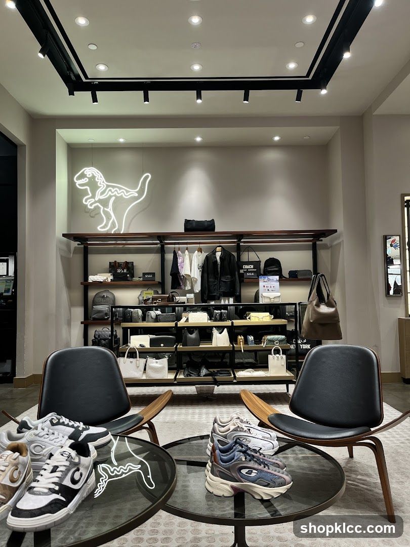 Interior of a modern retail store with sneakers and fashion items