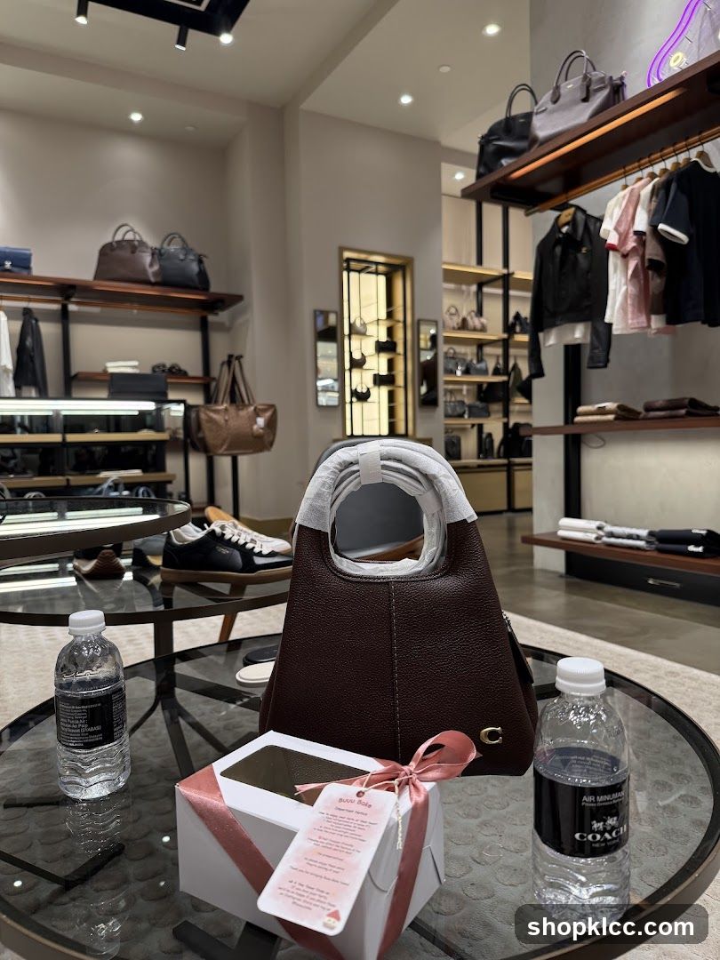 Coach Store Interior with Gift Box and Water Bottles