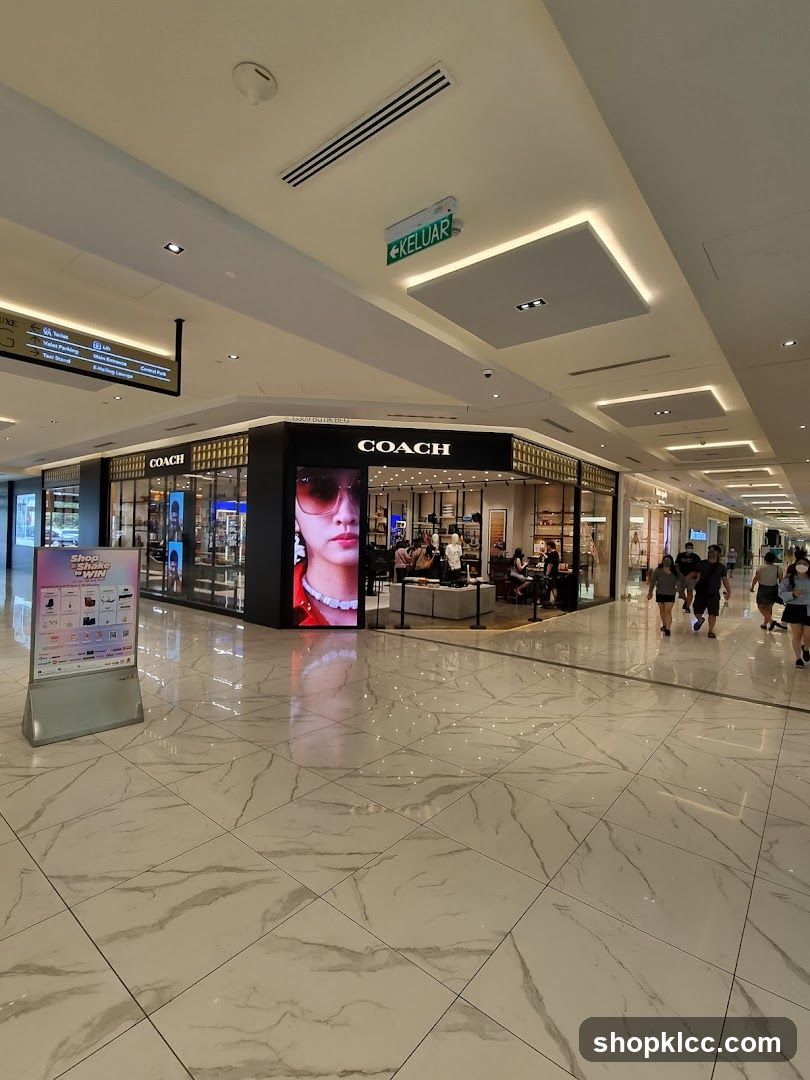 Shopping Mall Interior with Coach Storefront