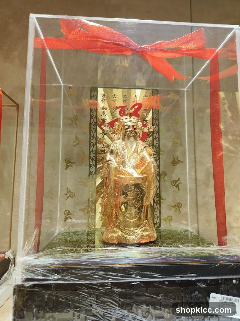 Golden Statue in Display Case