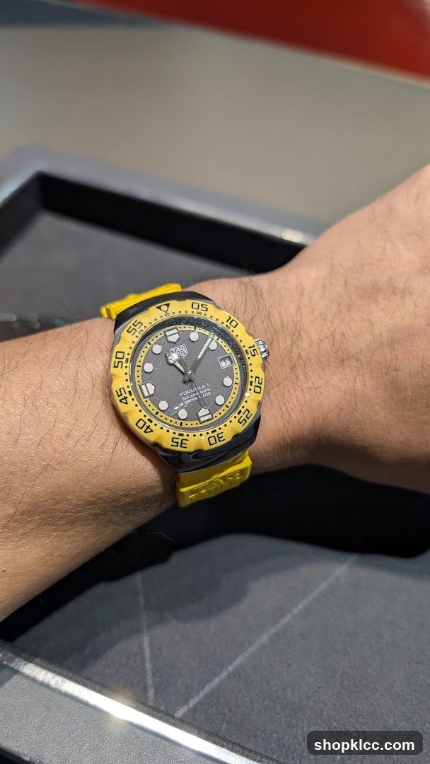 Yellow and Black Watch on Wrist