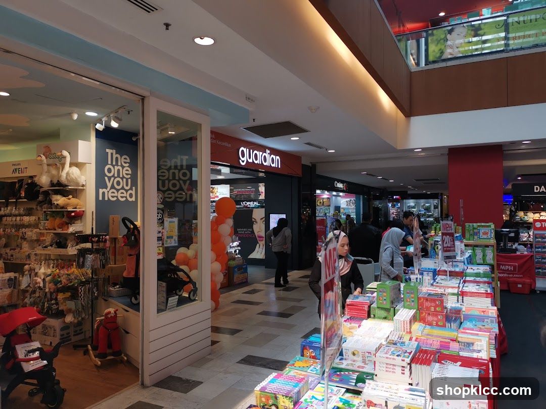 Shopping Mall Interior with Storefronts and Book Display