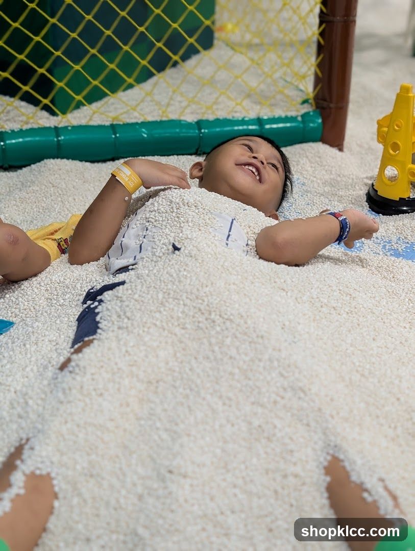 Child in Sand Pit