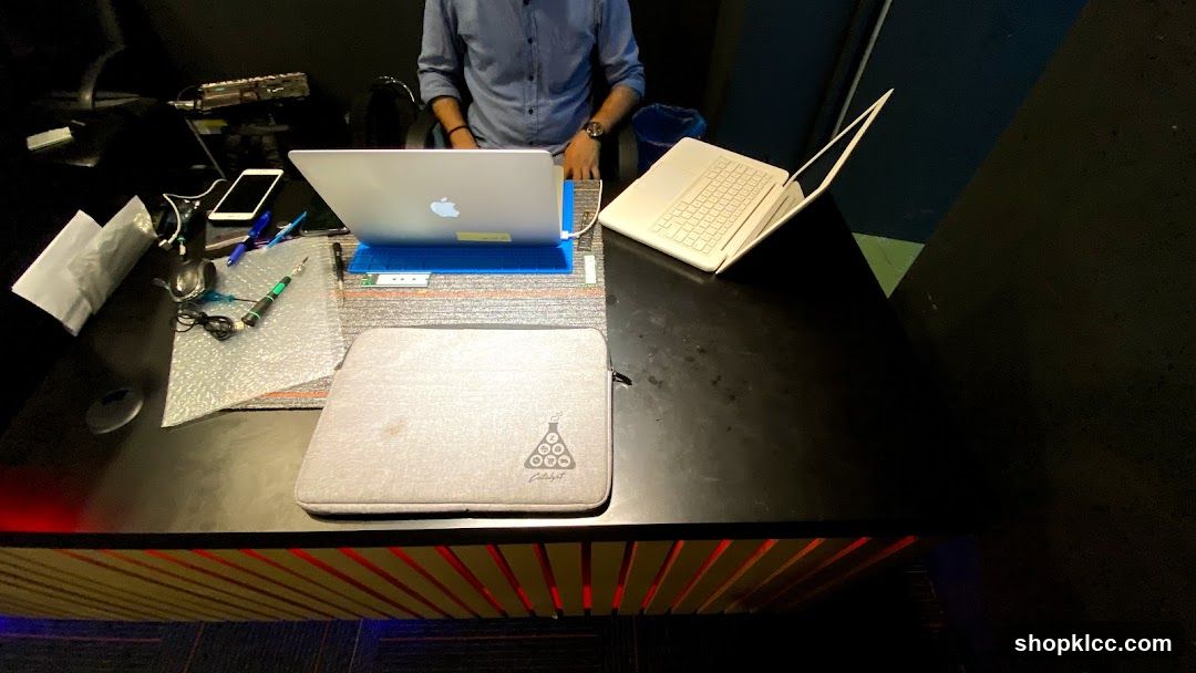Desk Setup with Laptops and Accessories