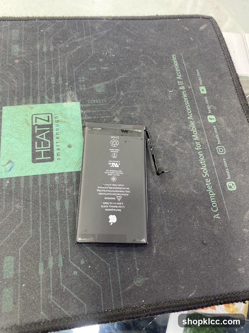 Apple Battery on Mat