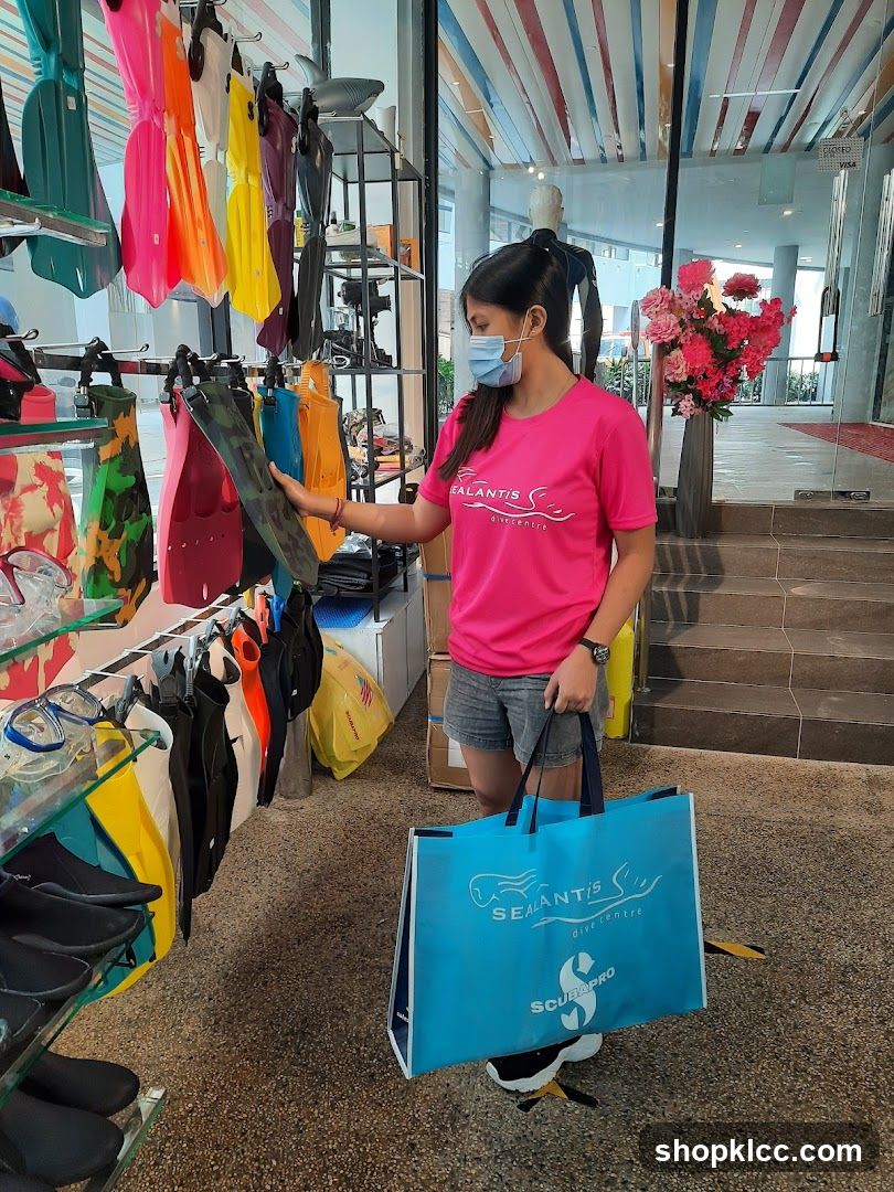 Woman Shopping in Swimwear Store