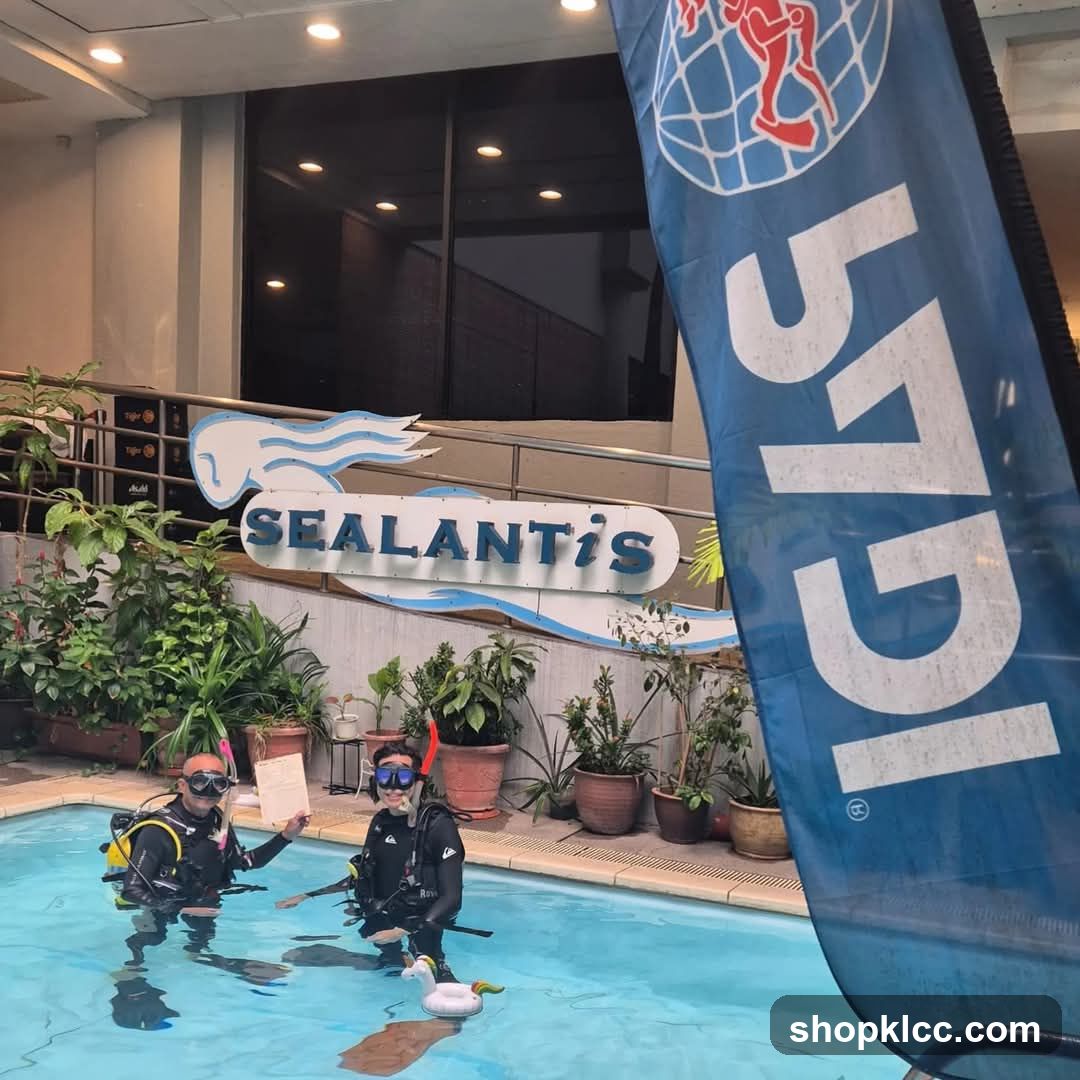 Divers in Pool with Sealantis Signage