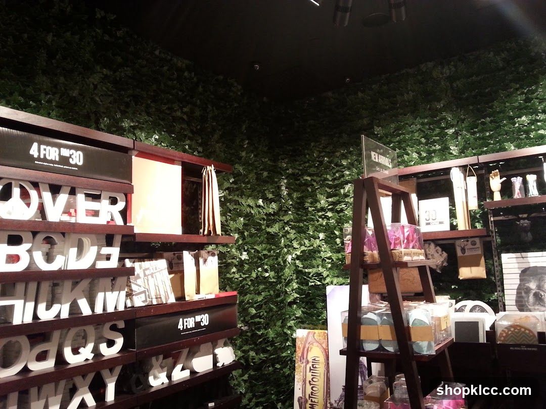 Interior Shop Display with Greenery Wall