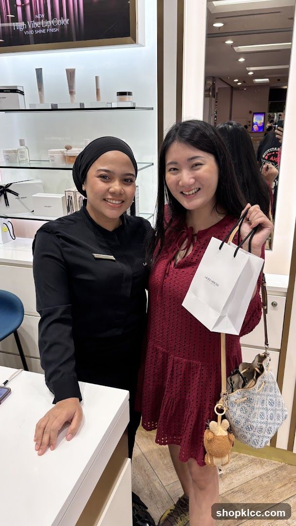Beauty Store Interior with Staff and Customer