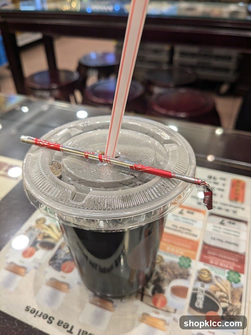 Iced Tea with Straw and Chopstick