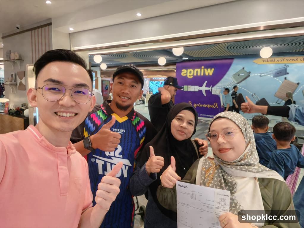 Group selfie in mall food court area