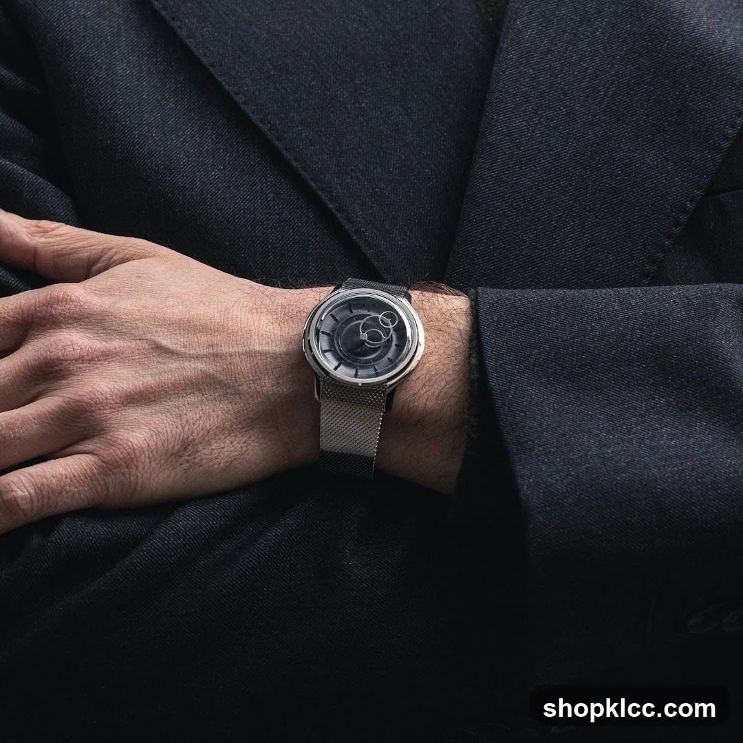Watch on wrist in dark suit