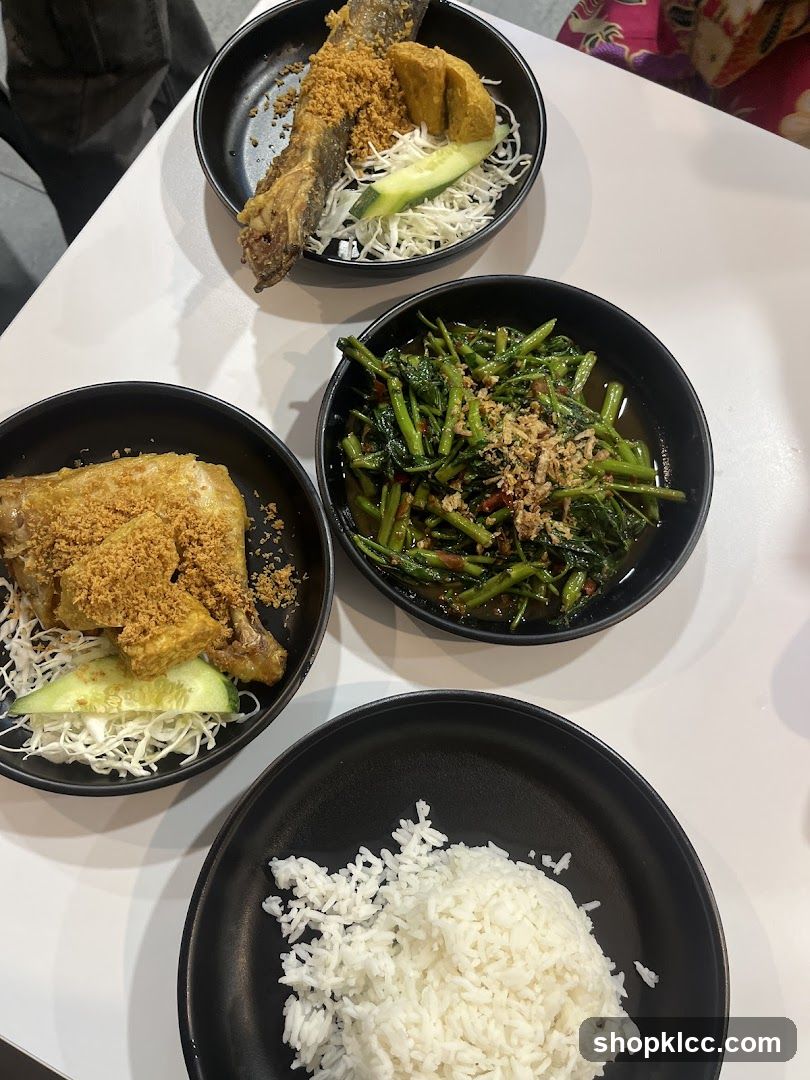 Fried Fish and Chicken with Rice and Vegetables