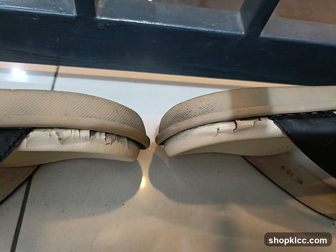 Worn Sandals on Tile Floor