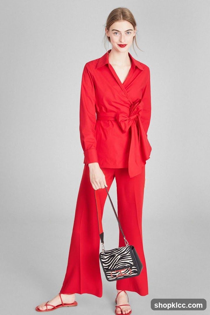 Woman in Red Outfit with Zebra Print Bag