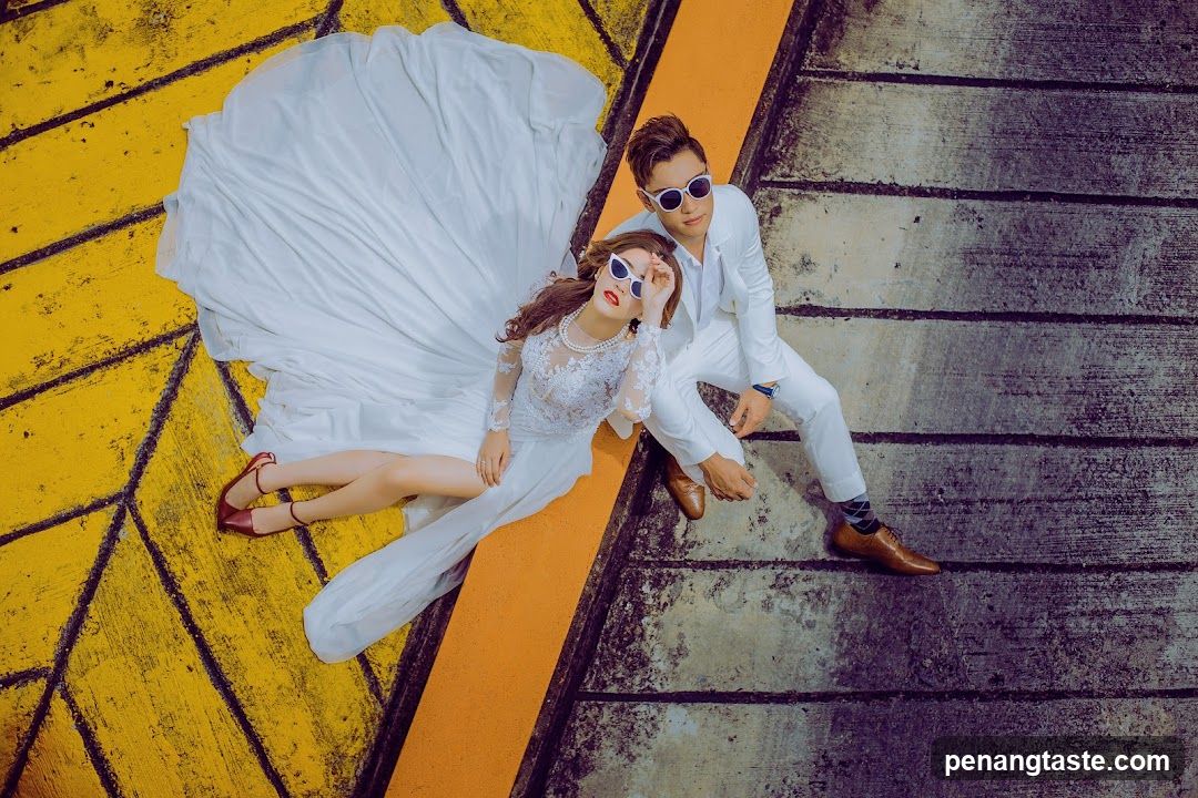 Couple Posing on Yellow and Gray Surface