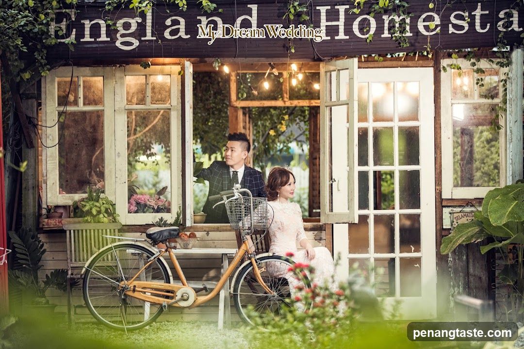 Couple Posing in Front of a Homestay