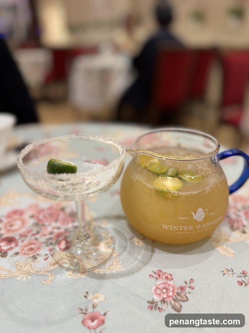 Beverages on a floral tablecloth